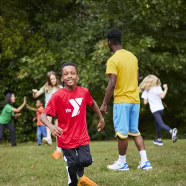 kids playing a game at ymca camp