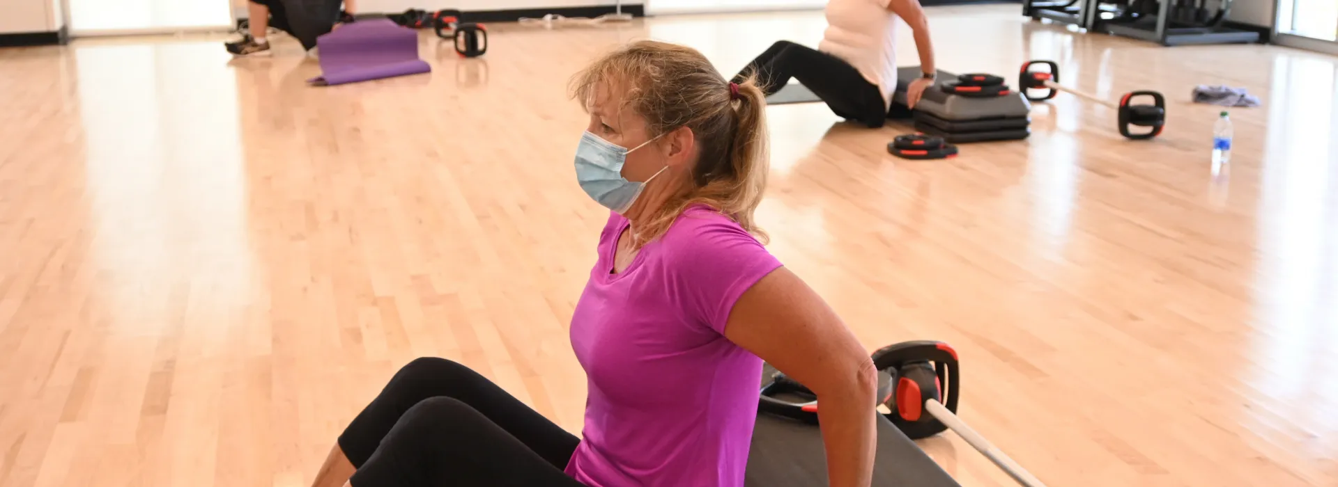 socially distanced women excerising