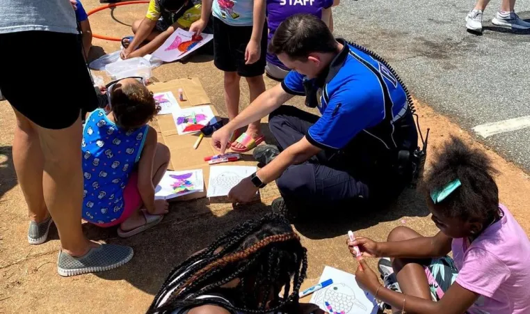 y staff and police engage with kids