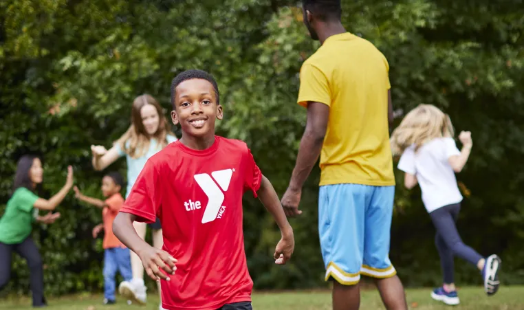 kids playing a game at ymca camp
