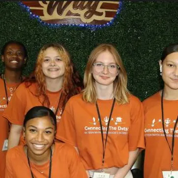 five teenage girls from New RIver YMCA smile for photo